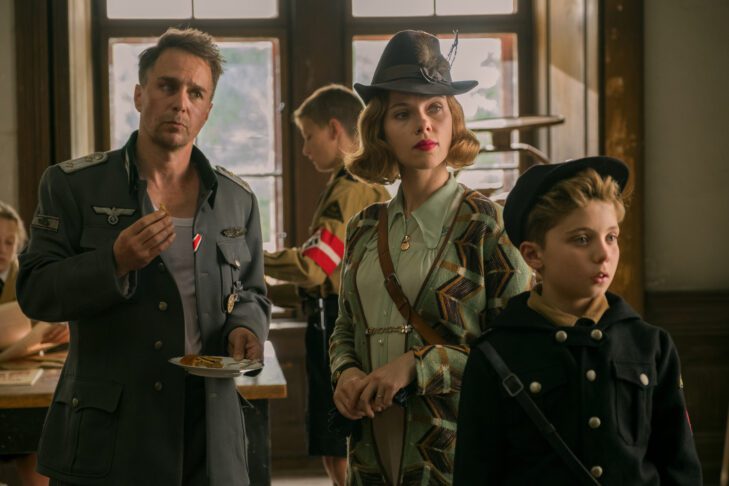 Sam Rockwell, Scarlett Johansson and Roman Griffin Davis in “Jojo Rabbit” (Courtesy photo: Larry Horricks/Twentieth Century Fox Film Corporation)